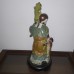 FIGURA ORIENTAL ANCIANO CON NIÑO DE BRACONS